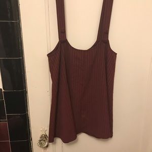 A red suspender skirt